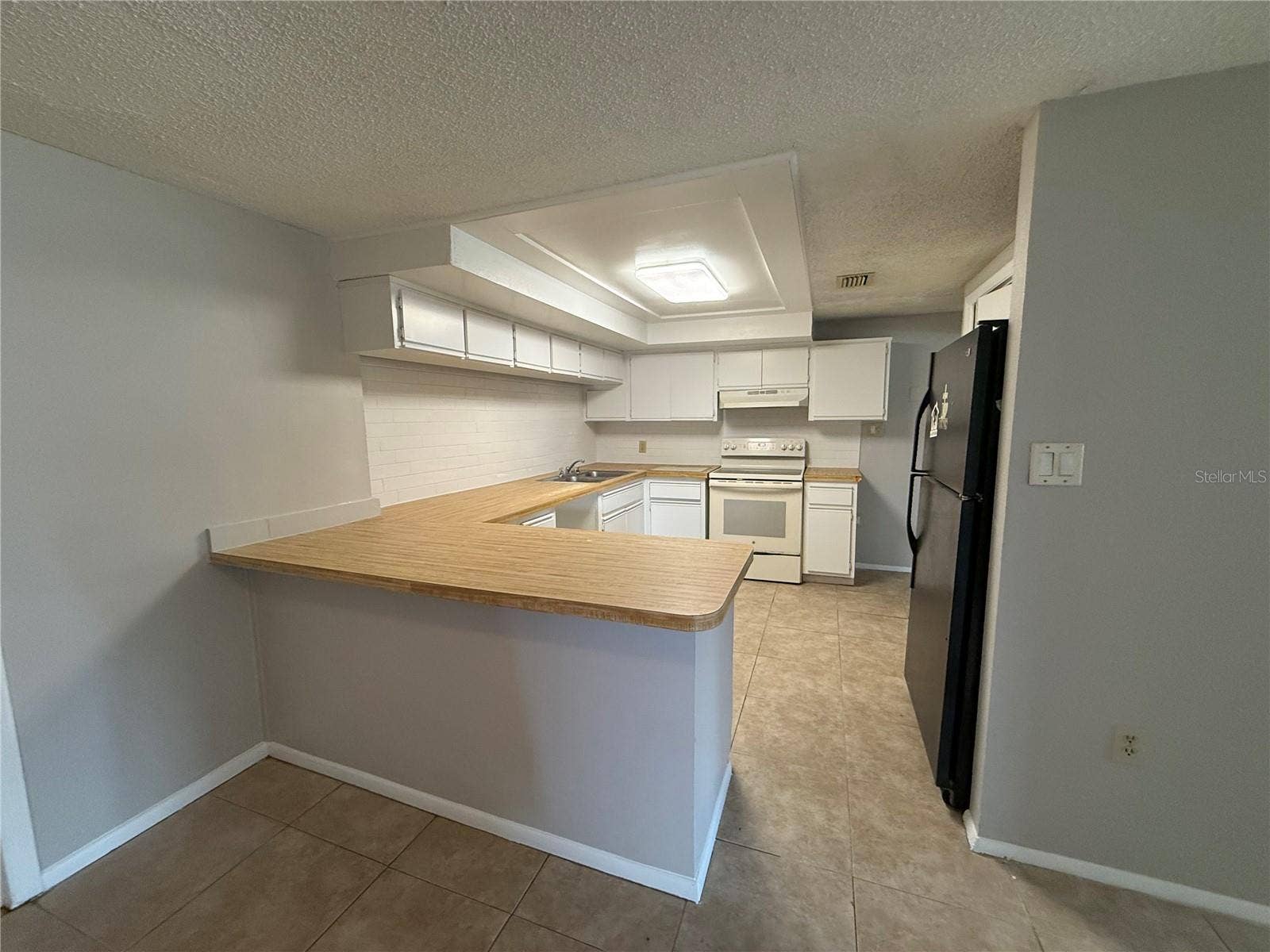 3425 WOODCOCK DRIVE, Holiday, FL 34690