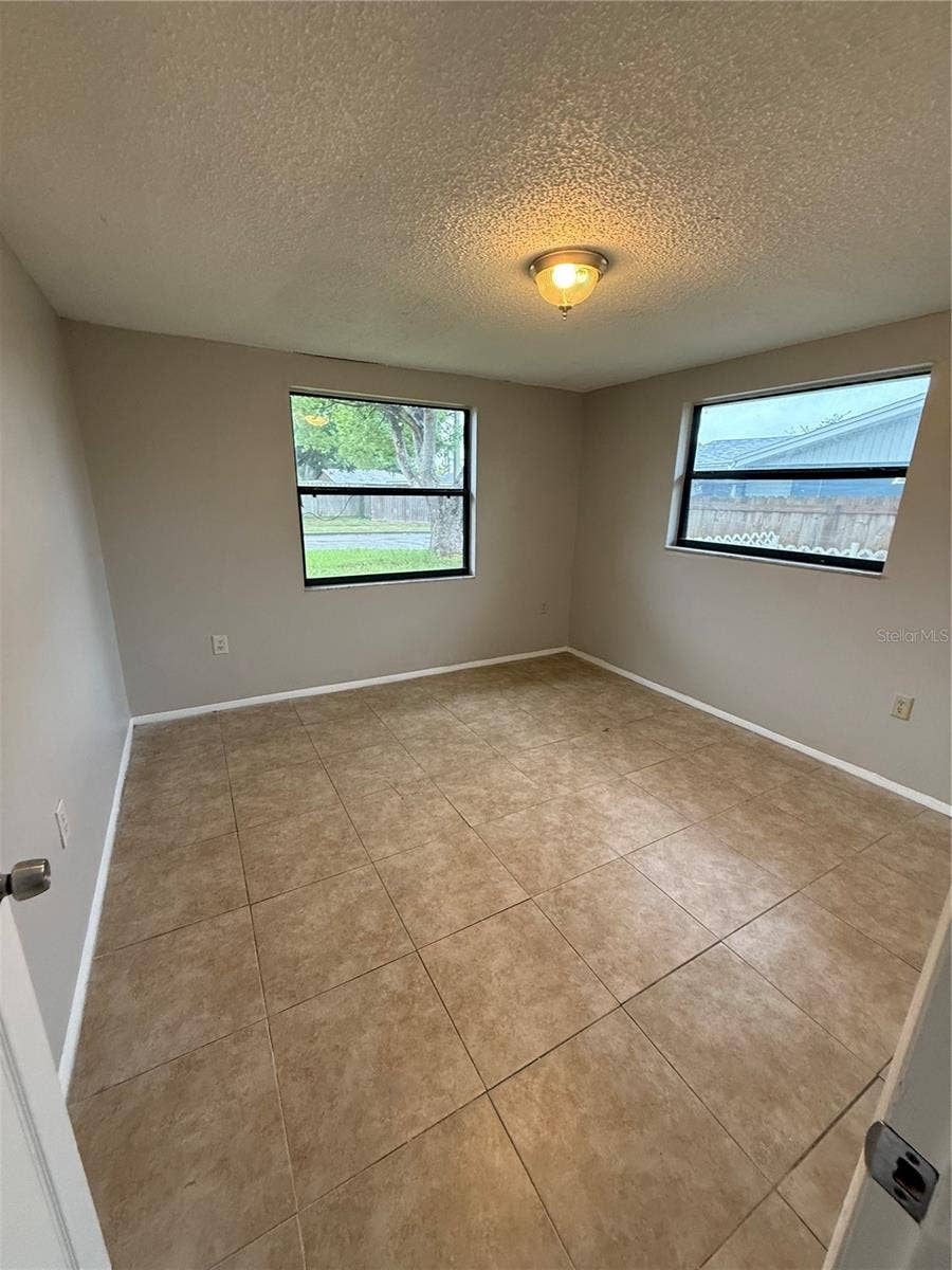 3425 WOODCOCK DRIVE, Holiday, FL 34690