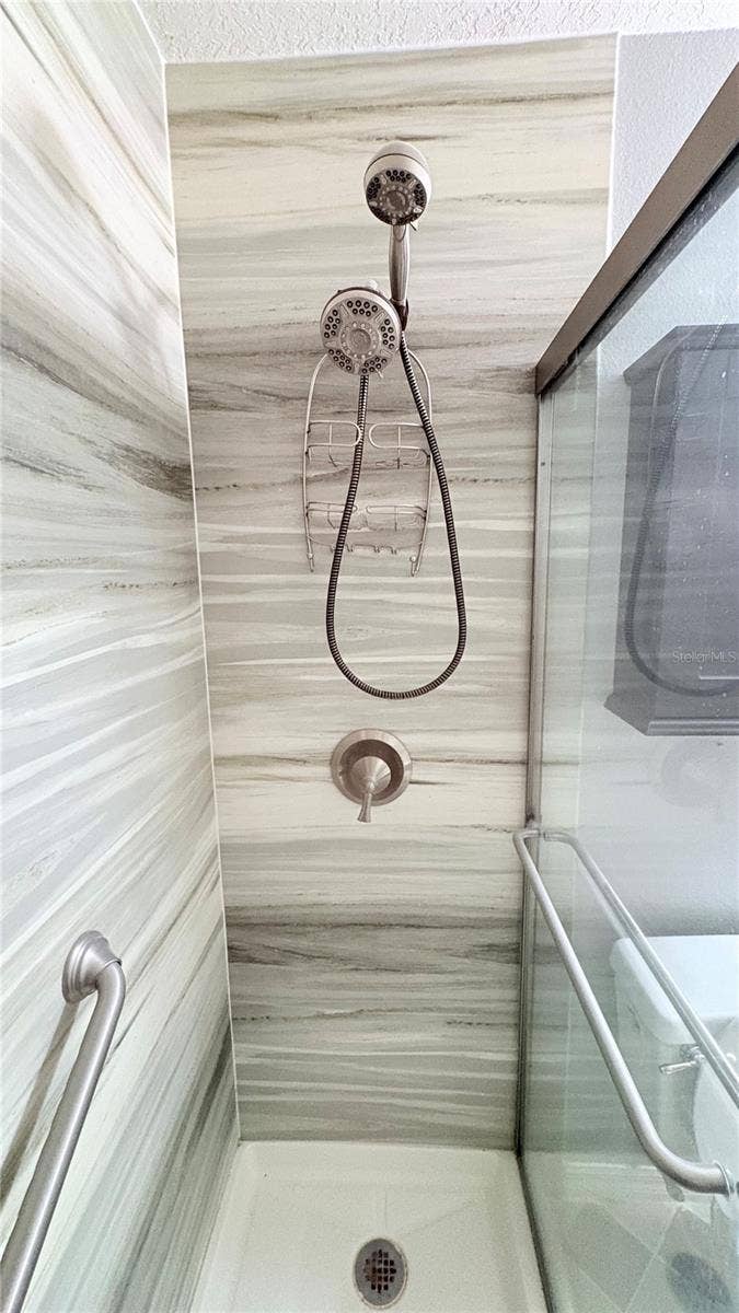 13049 SCOTTVILLE STREET, Spring Hill, FL 34609 Guest bath shower