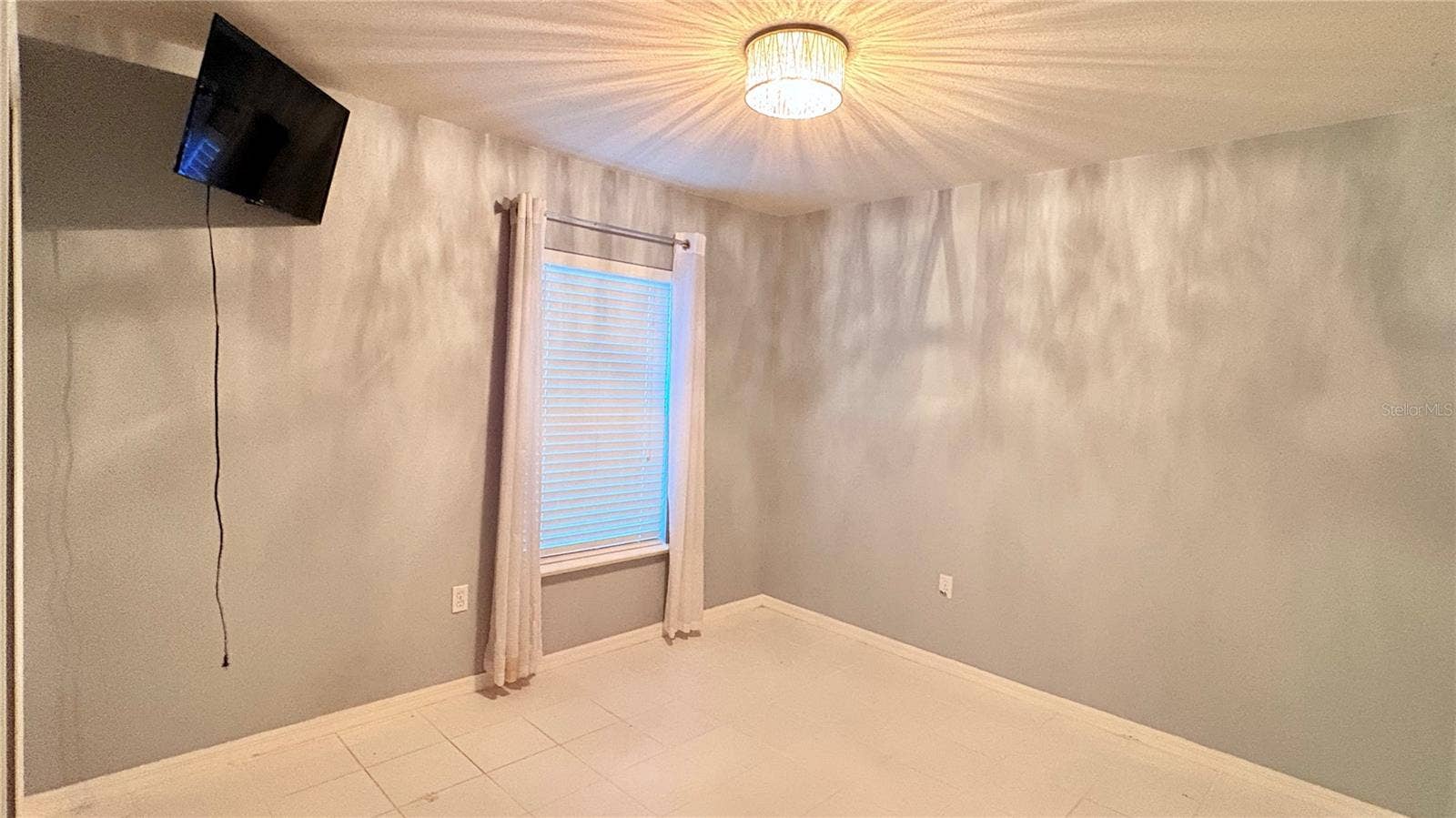 13049 SCOTTVILLE STREET, Spring Hill, FL 34609 3rd bed with wall mounted TV