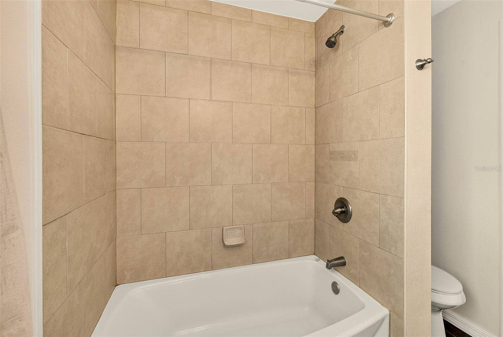 14330 CHANNEL DRIVE, Largo, FL 33774 Hall Bath has a Tub and Shower