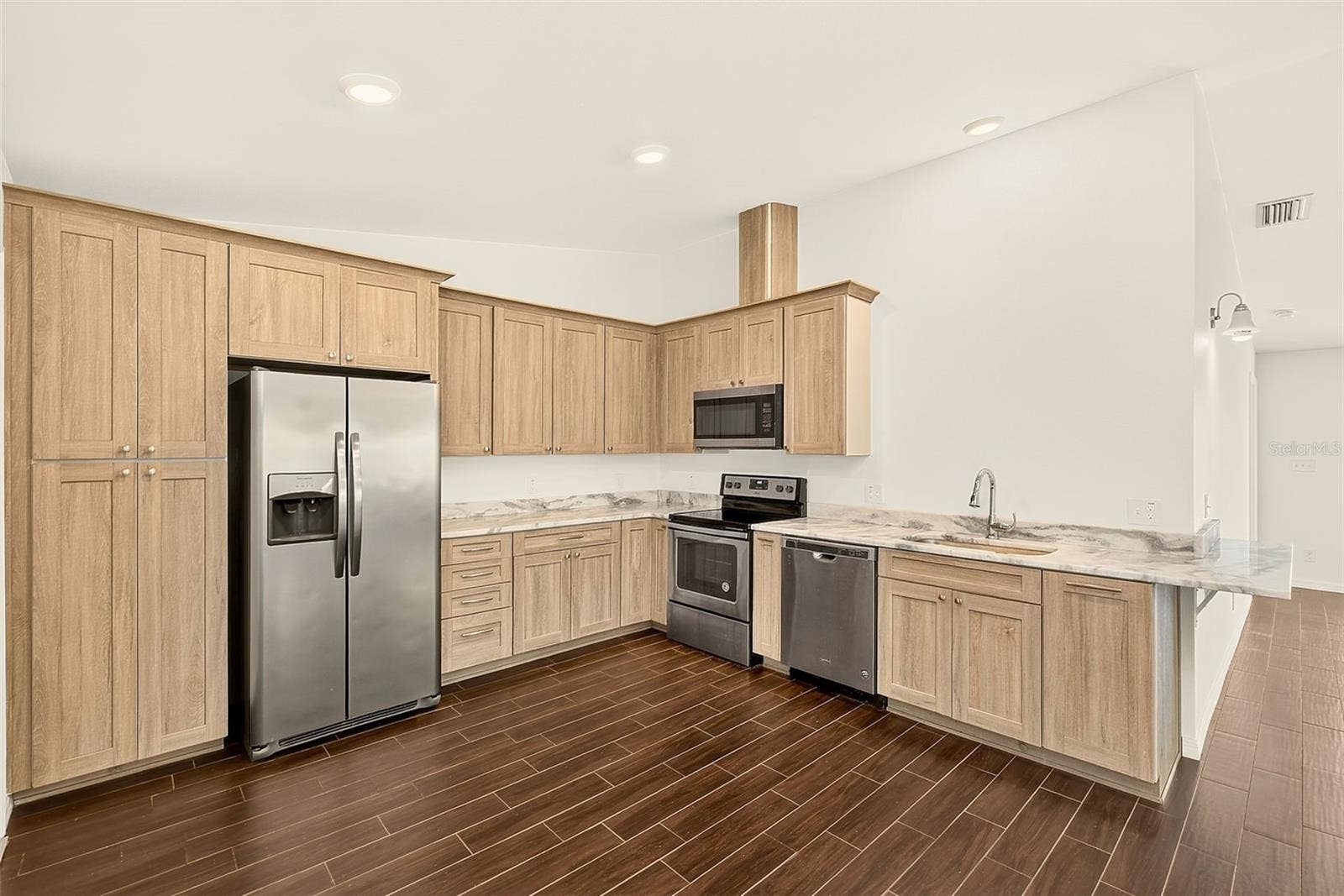 14330 CHANNEL DRIVE, Largo, FL 33774 Large Kitchen has SS appliances