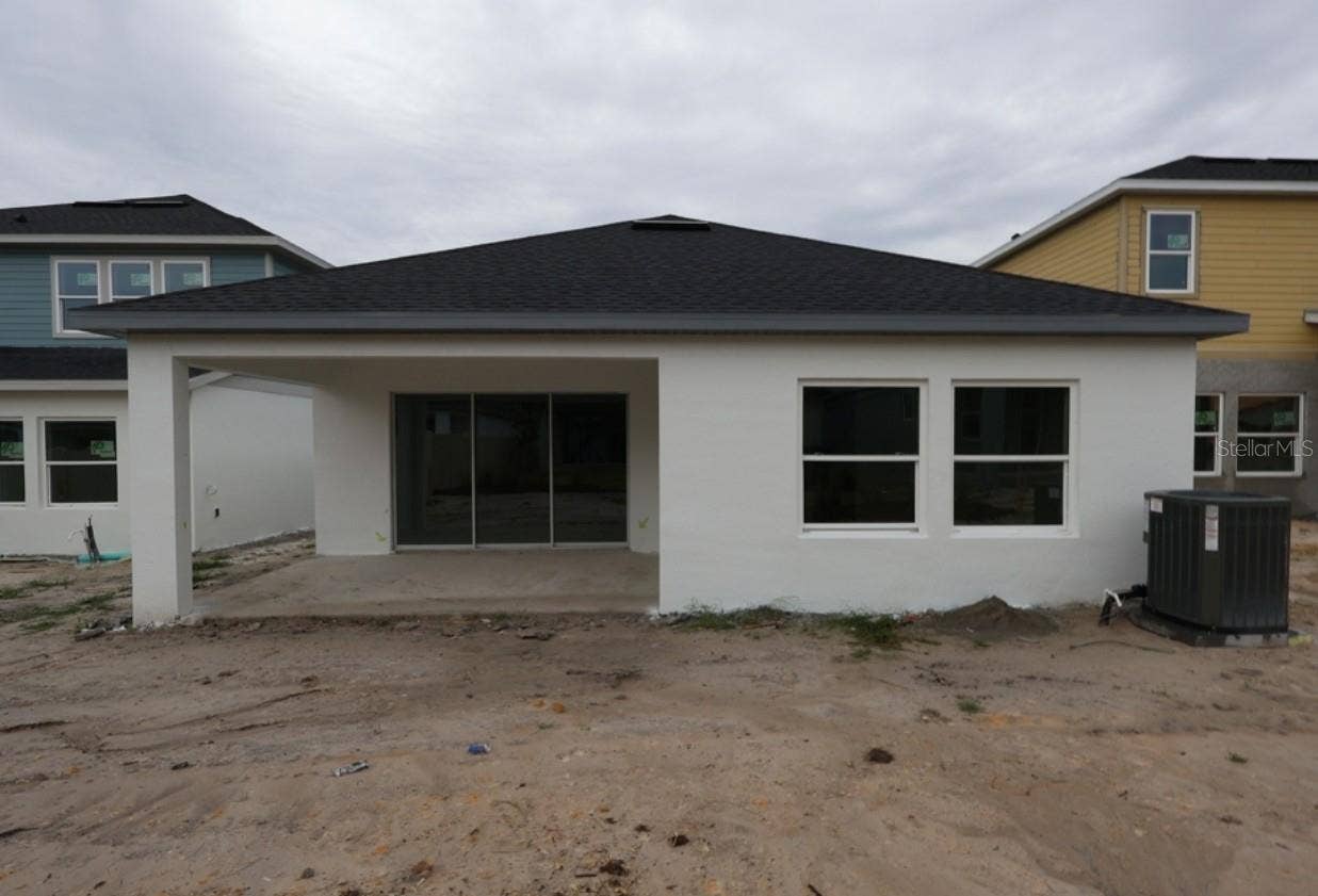 5410 KNOTTY OAK STREET, Mount Dora, FL 32757 Rear Exterior **Under Construction