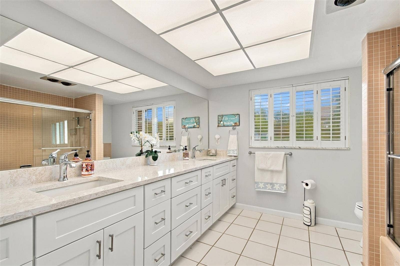 11975 7TH STREET E, Treasure Island, FL 33706 Guest Bath with Double Vanities