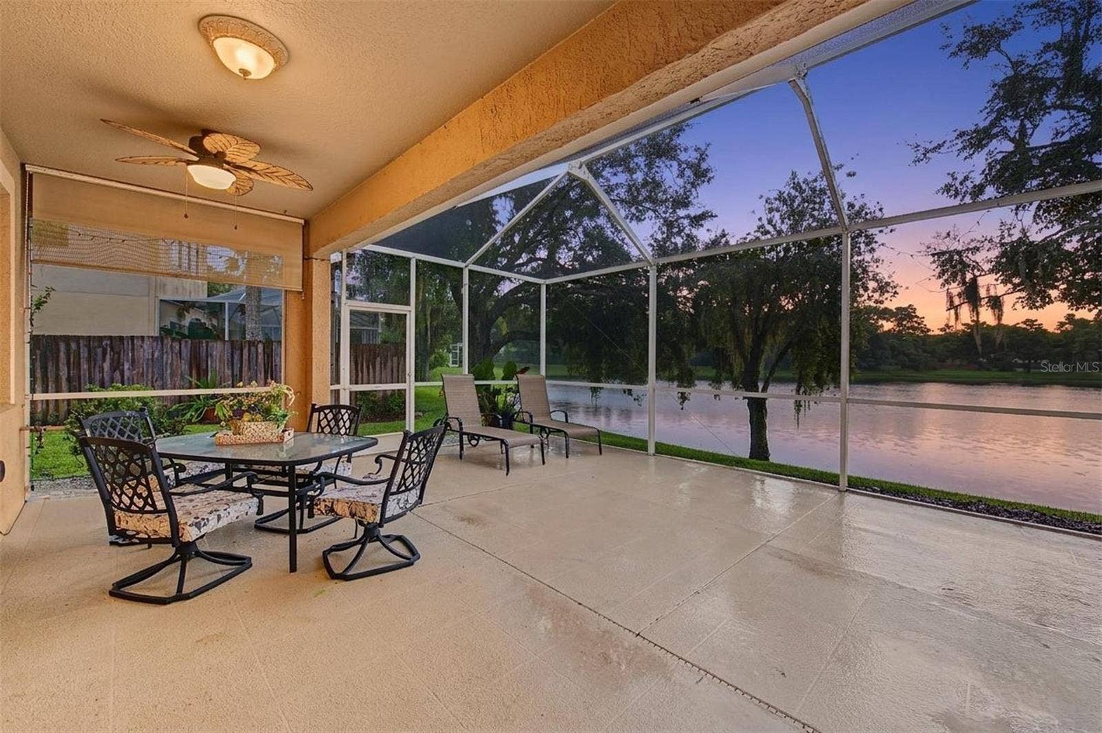 Covered and screened back lanai - great pond view