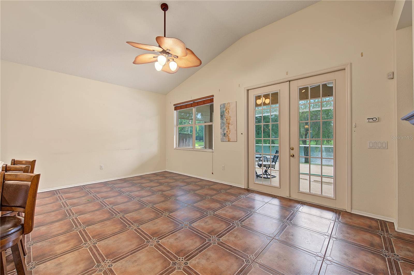 Family room with all views pointing to the pond through the french doors.