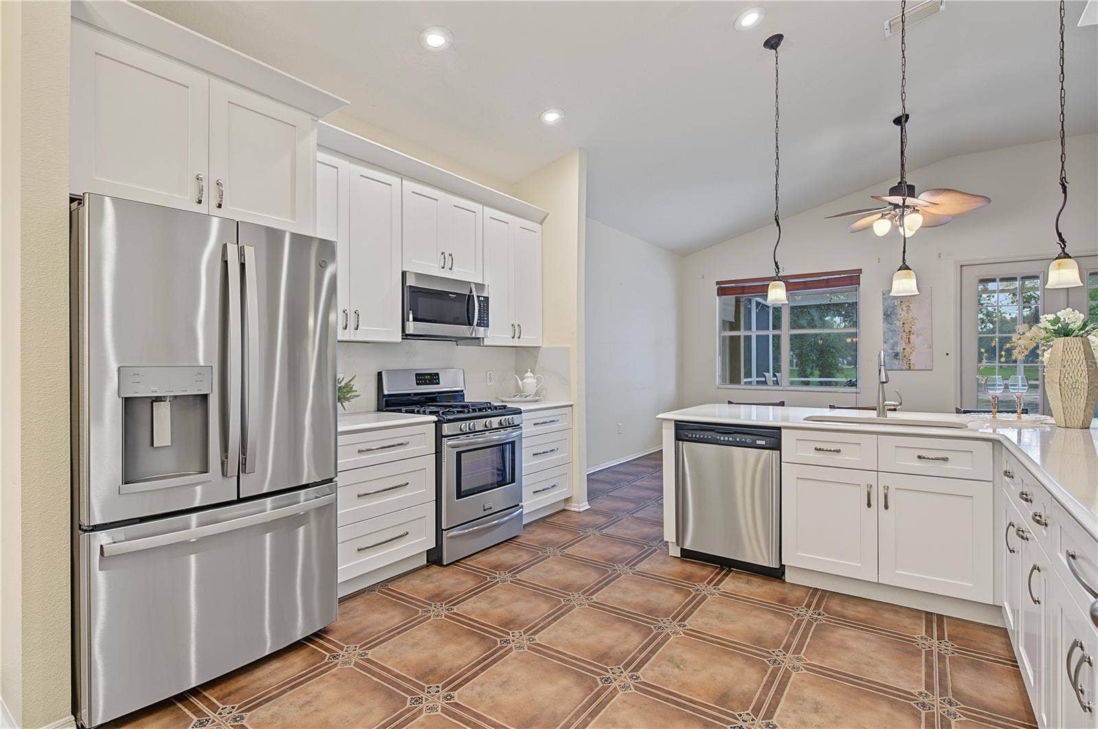 Recently updated Kitchen Cabinets and Appliances, Inset lights and drop down lights, pot drawers, soft close and more.