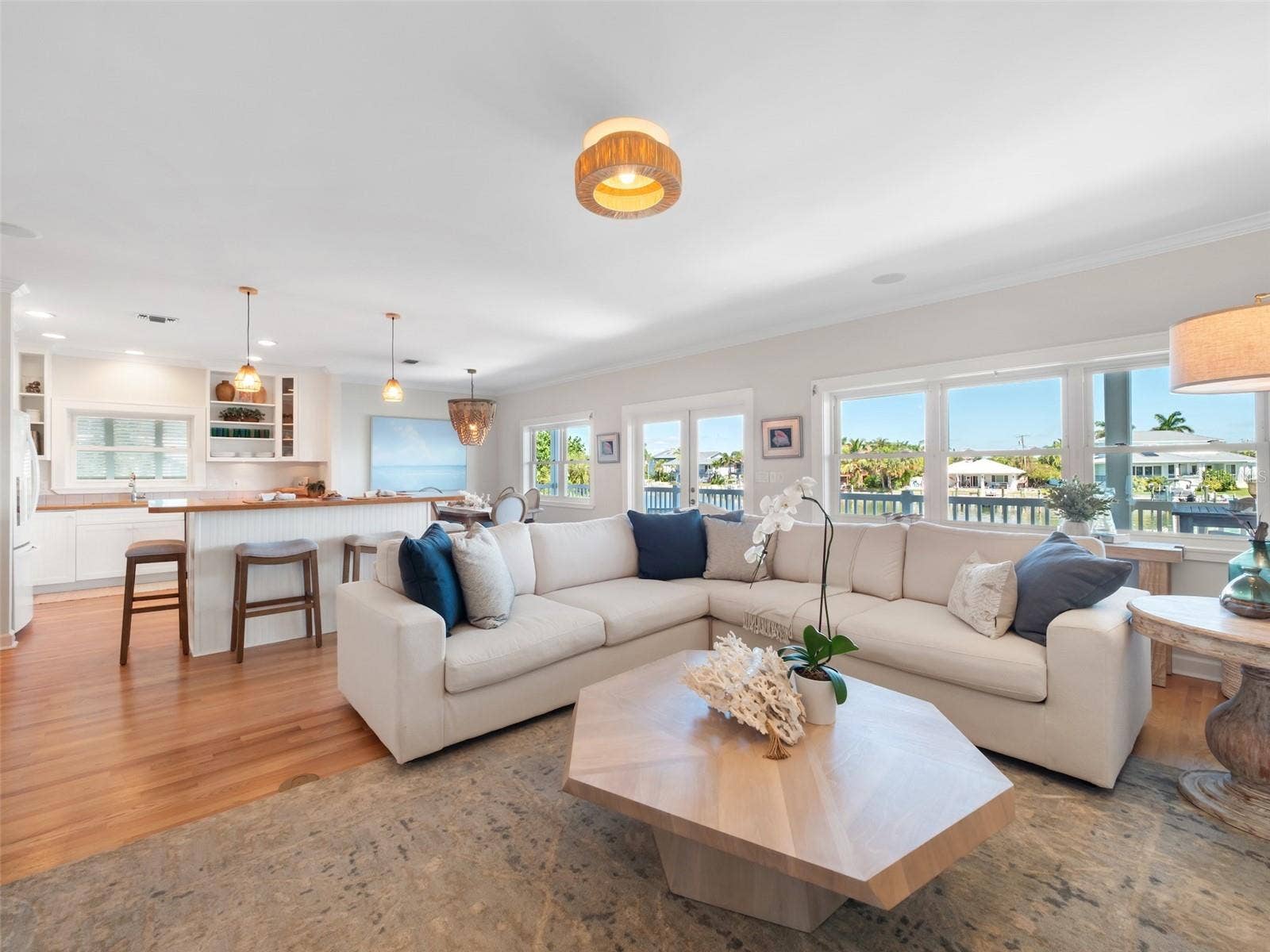 Warm woods anchor inviting entertaining area