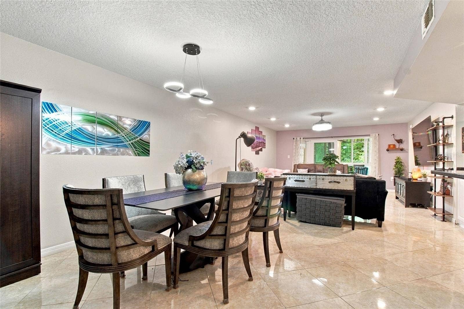 2511 DOLLY BAY DRIVE, #104, Palm Harbor, FL 34684 Dining Room into Open Concept LR, Kitchen