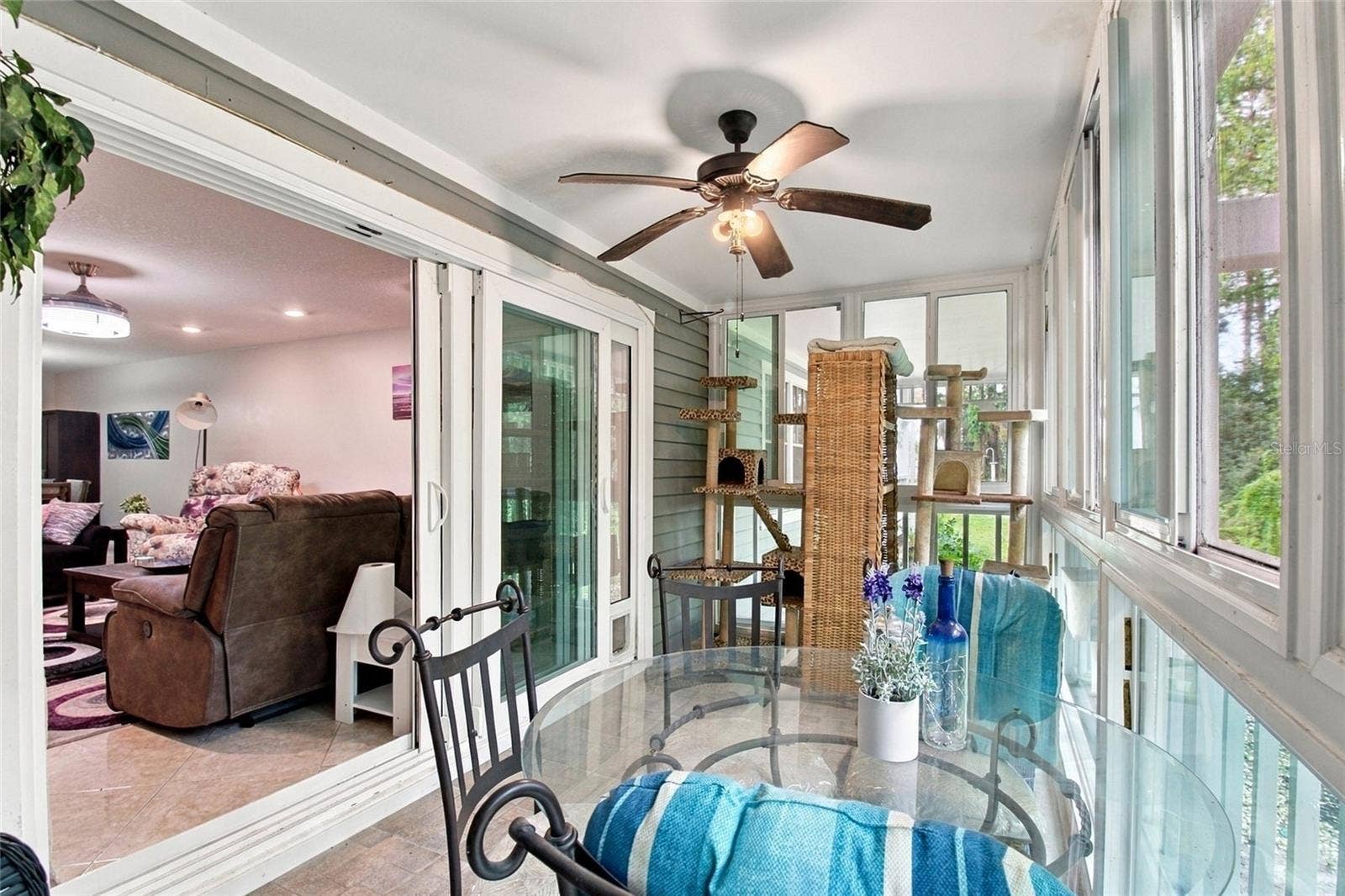 2511 DOLLY BAY DRIVE, #104, Palm Harbor, FL 34684 Spacious Lanai and sliders with small pet door