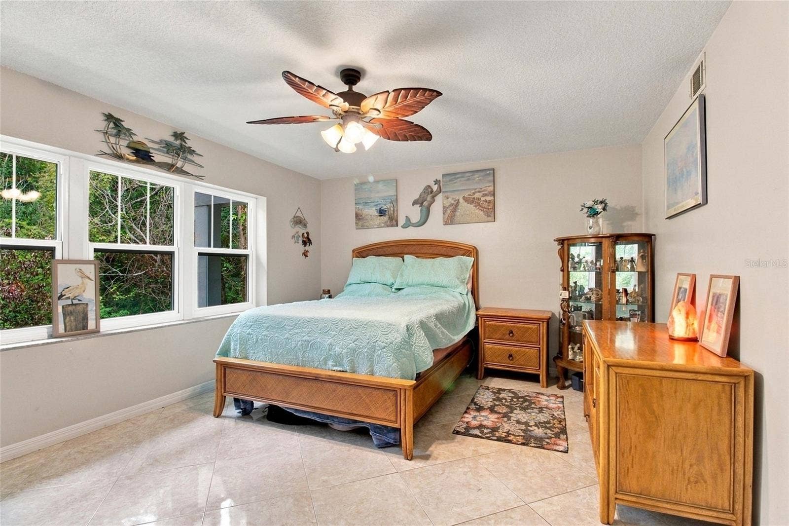 2511 DOLLY BAY DRIVE, #104, Palm Harbor, FL 34684 Primary Bedroom with Lush Nature Views