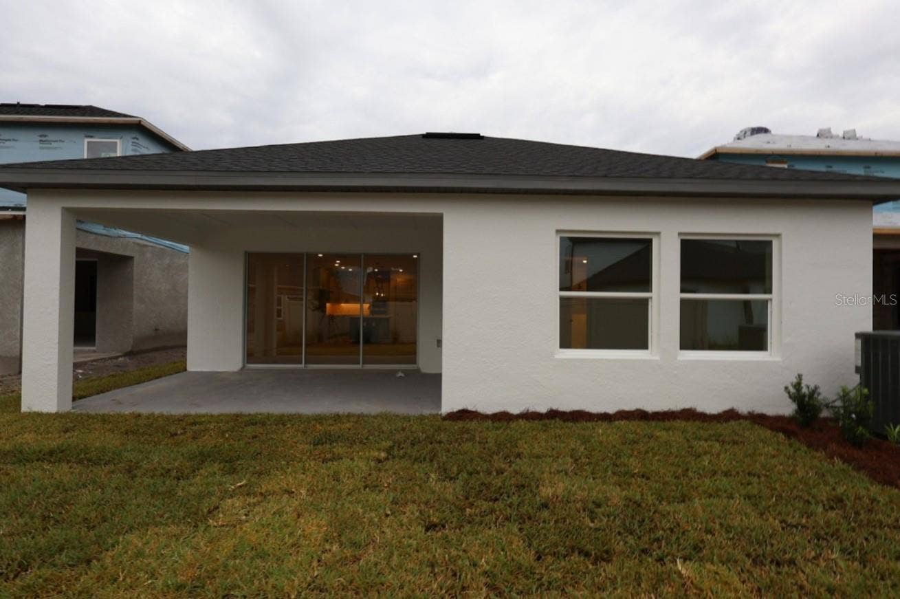 5446 KNOTTY OAK STREET, Mount Dora, FL 32757 Rear Exterior **Under Construction