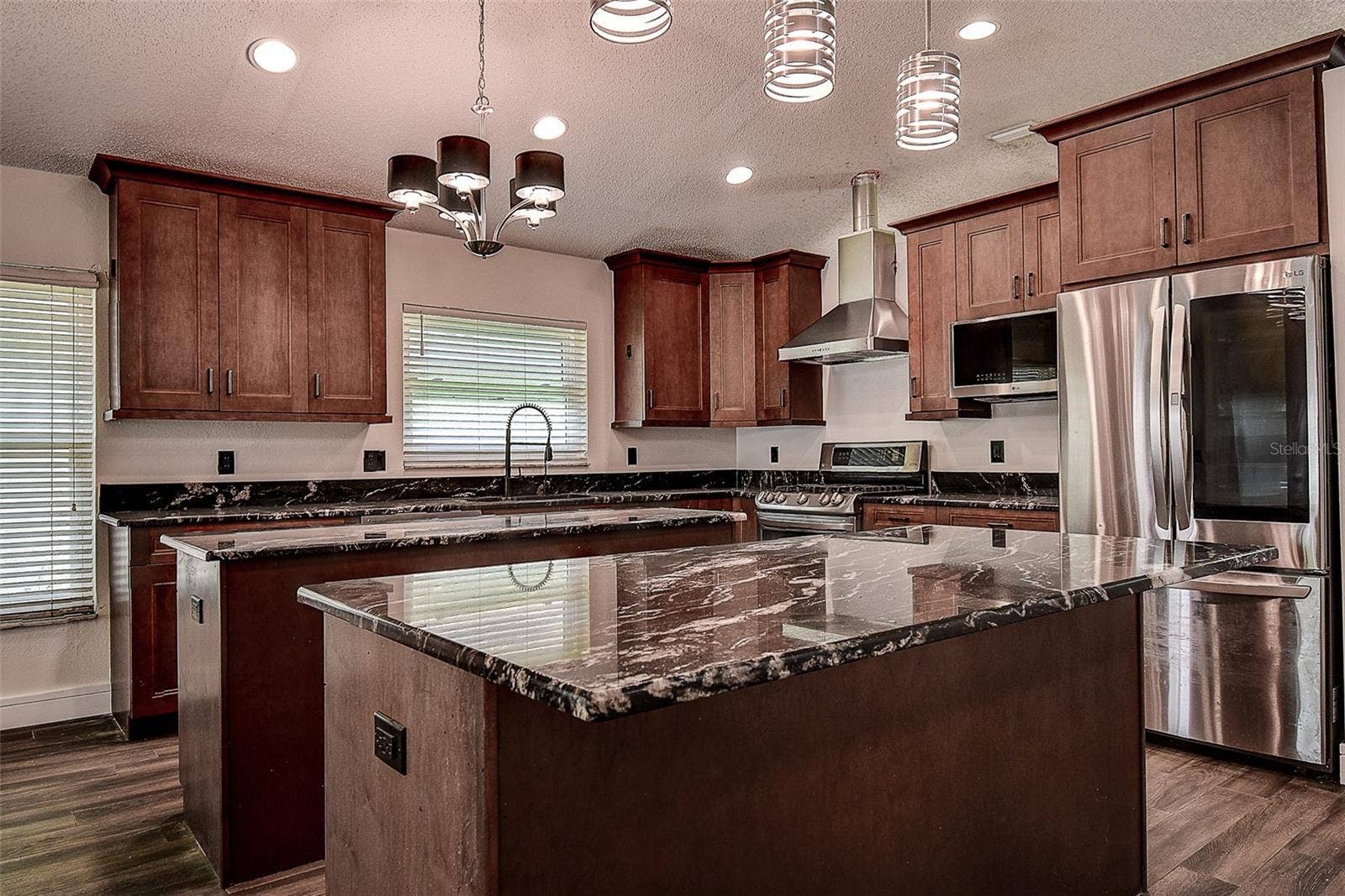 1709 SCOTCH PINE DRIVE, Brandon, FL 33511 All stainless steel appliances including large LG refrigerator, range, and dishwasher