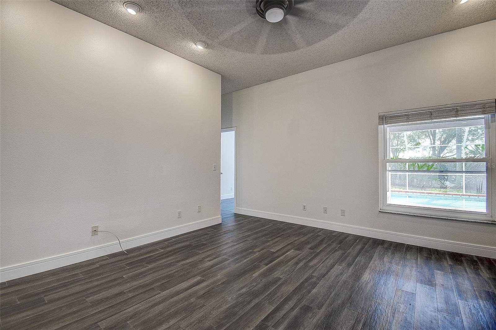 1709 SCOTCH PINE DRIVE, Brandon, FL 33511 Family Room leading to the pool and Primary Bedrooms