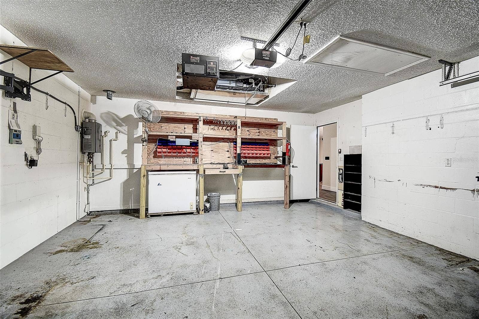 1709 SCOTCH PINE DRIVE, Brandon, FL 33511 Garage with built-in work bench.