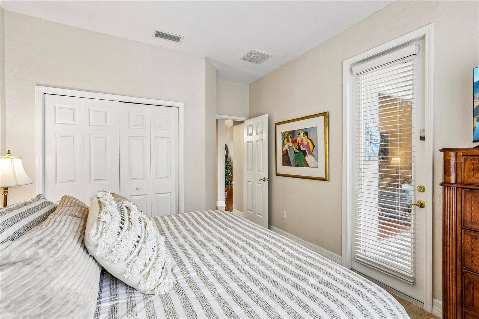 2nd BR w dble closets/door to pool