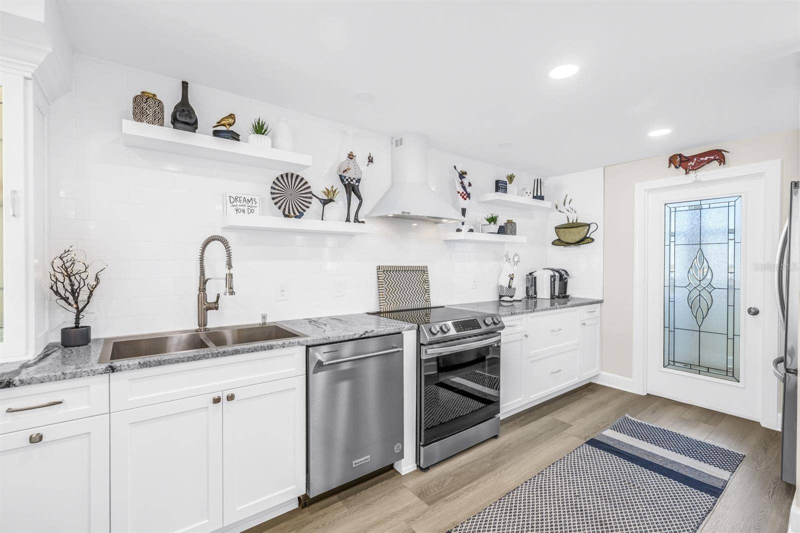 Kitchen with Glass Door to Pantry and Laundry Room