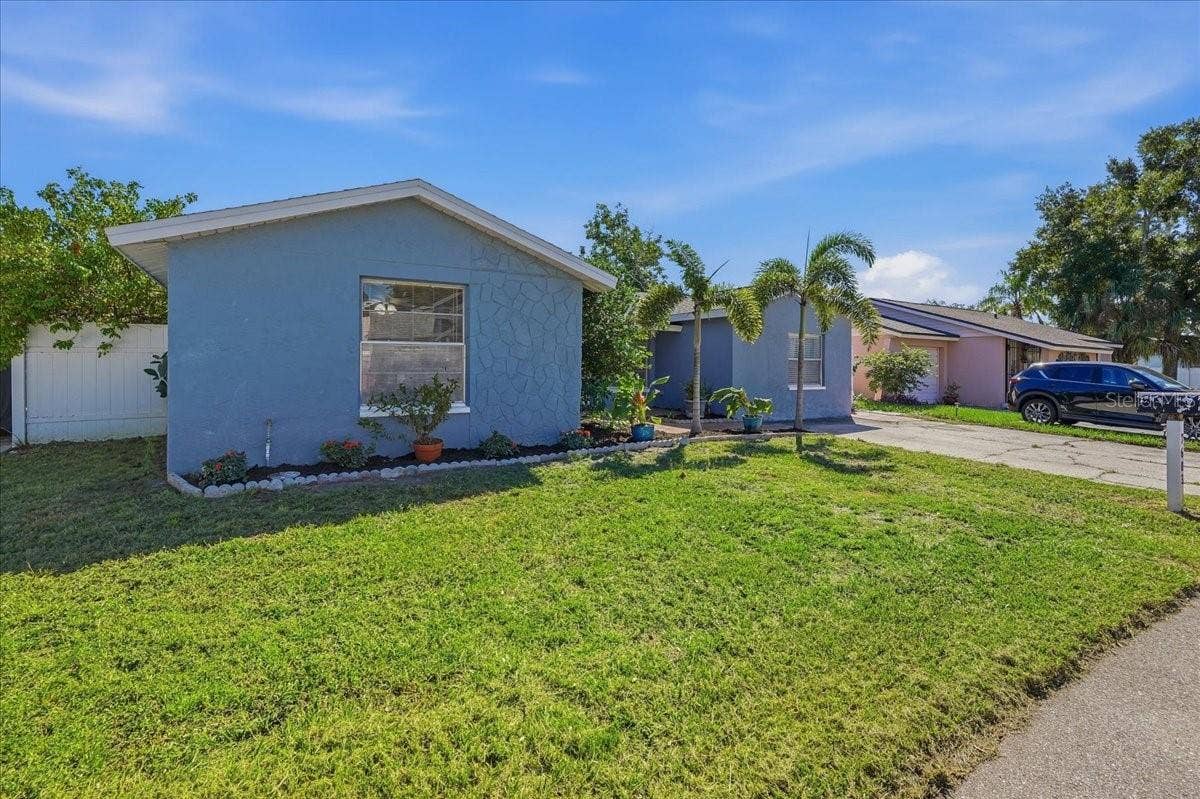 7603 WOODLAND OAKS COURT, Tampa, FL 33615