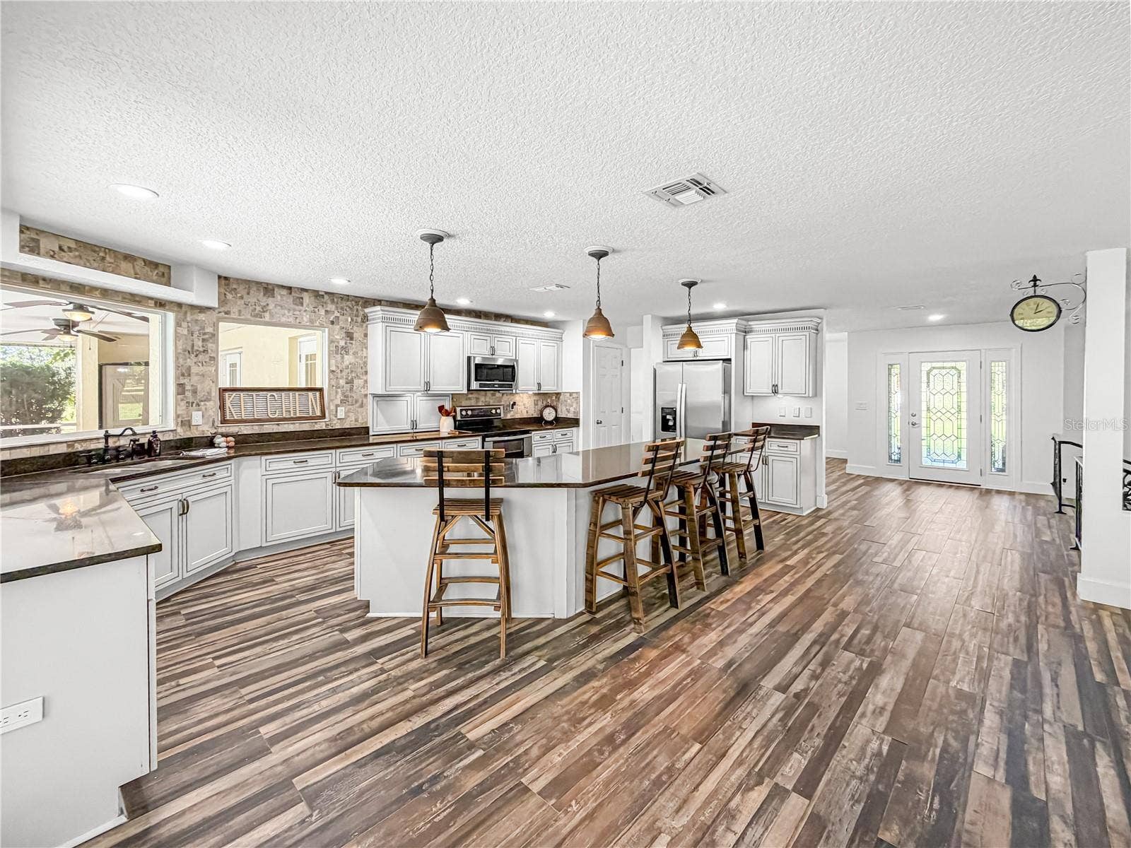 15561 PATRIOT DRIVE, Brooksville, FL 34601 Kitchen from Pool Entry