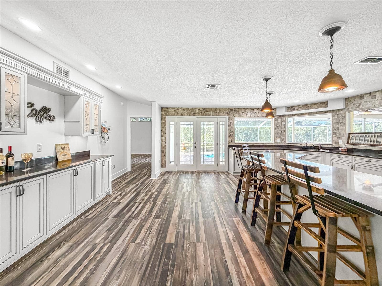15561 PATRIOT DRIVE, Brooksville, FL 34601 Kitchen to Pool