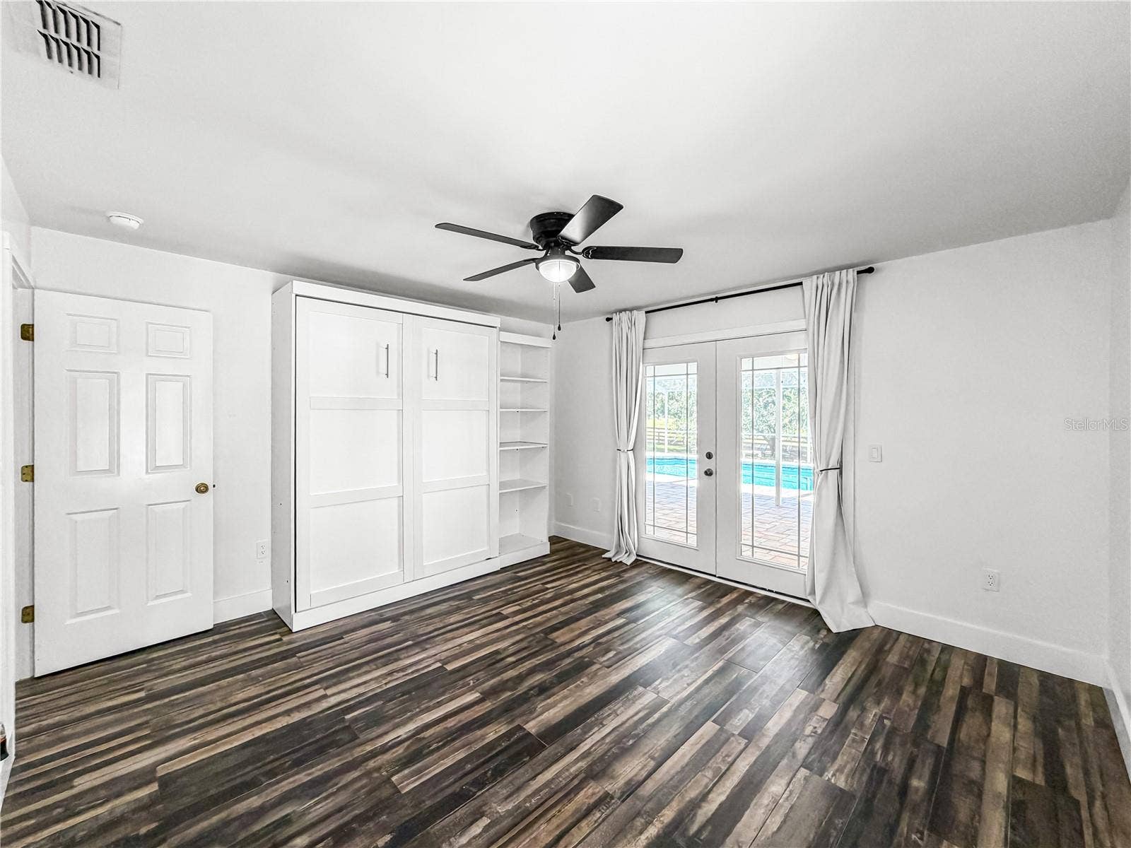 15561 PATRIOT DRIVE, Brooksville, FL 34601 Murphy Bedroom 2 to Pool
