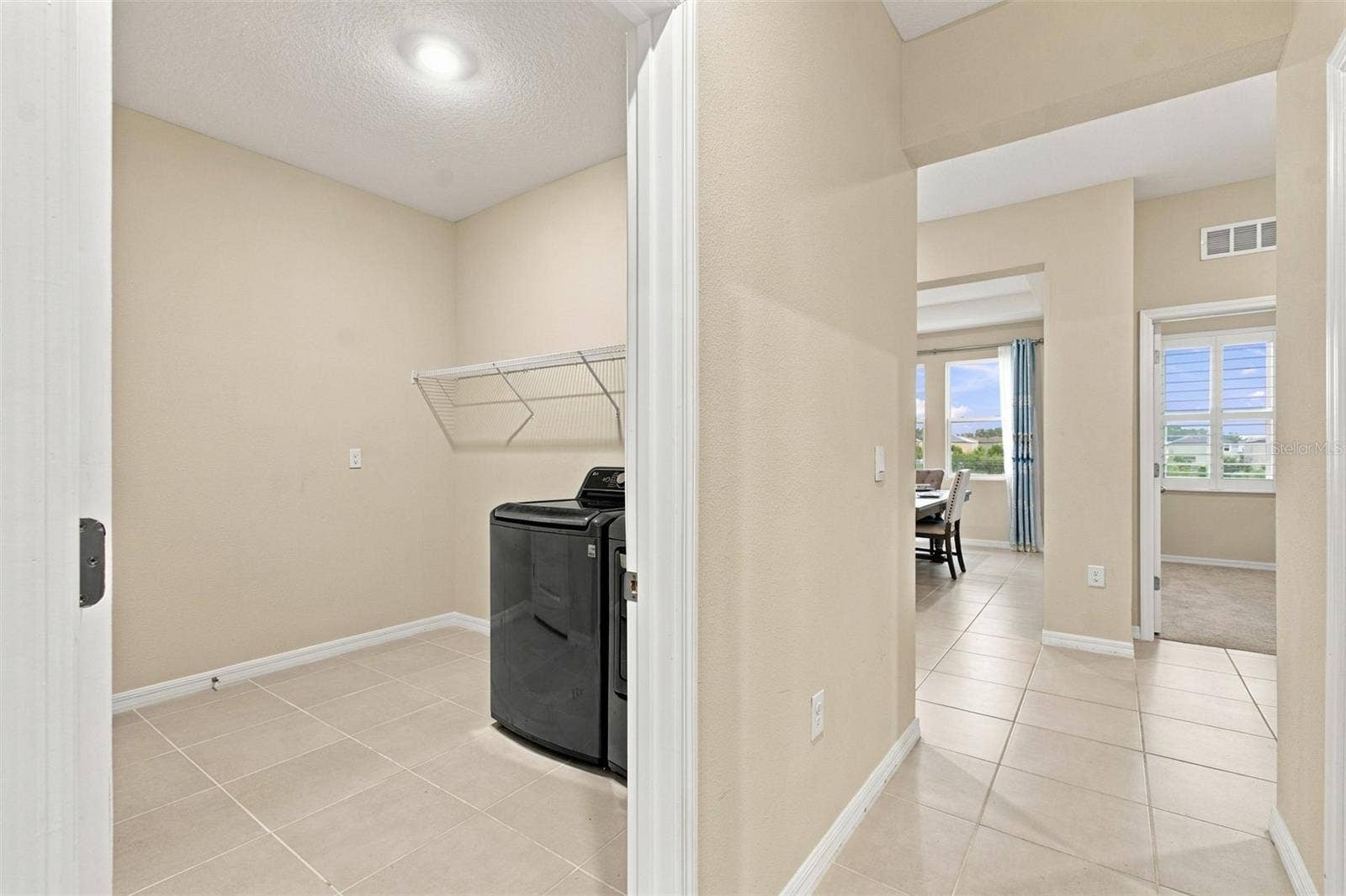 32337 CONCHSHELL SAIL STREET, Wesley Chapel, FL 33545 In house laundry room