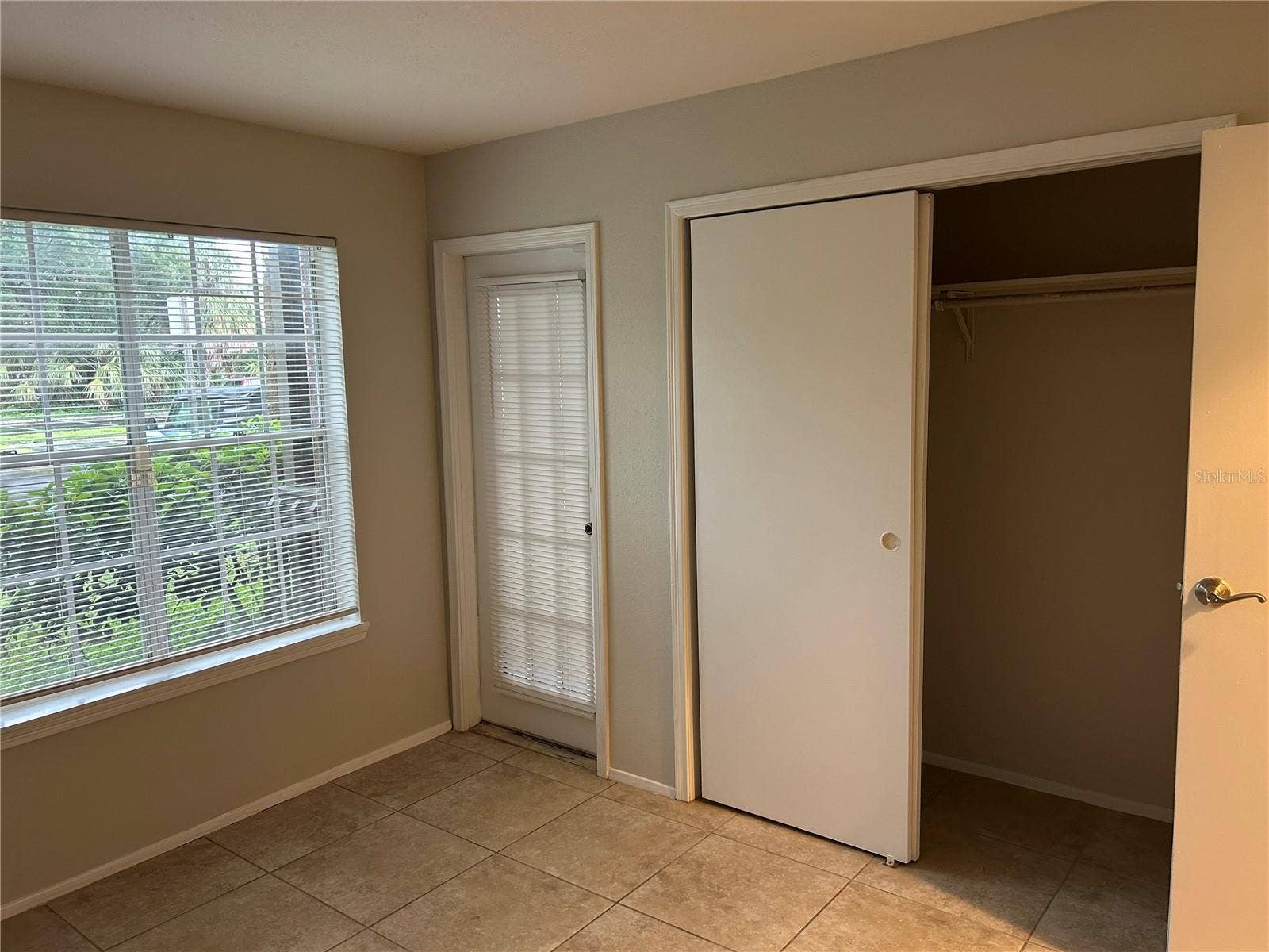 Bedroom 2 has door to patio