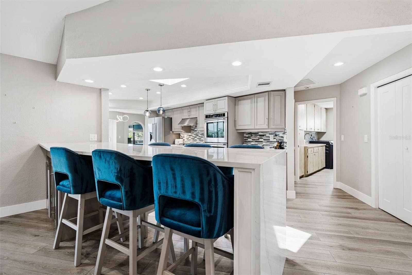 Bar leading into kitchen