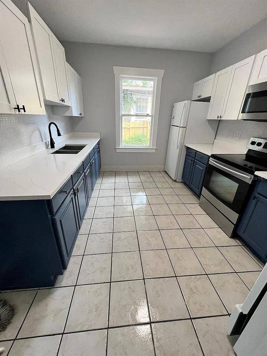 1021 E CAYUGA STREET, Tampa, FL 33603 1021 E CAYUGA STREET, Tampa, FL 33603