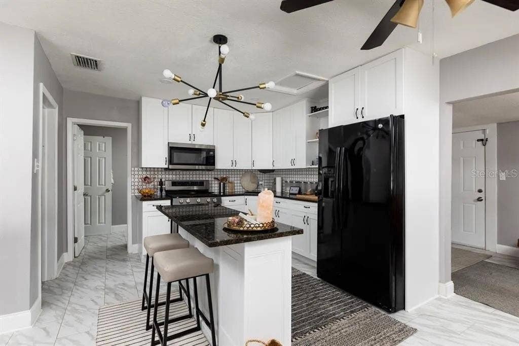 1201 E CAYUGA STREET, Tampa, FL 33603 1201 E CAYUGA STREET, Tampa, FL 33603