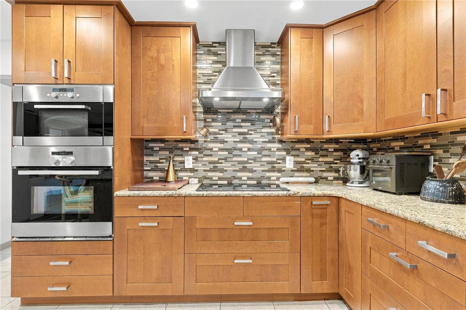 10211 139TH STREET, Largo, FL 33774 Kitchen cooktop and built in oven and microwave