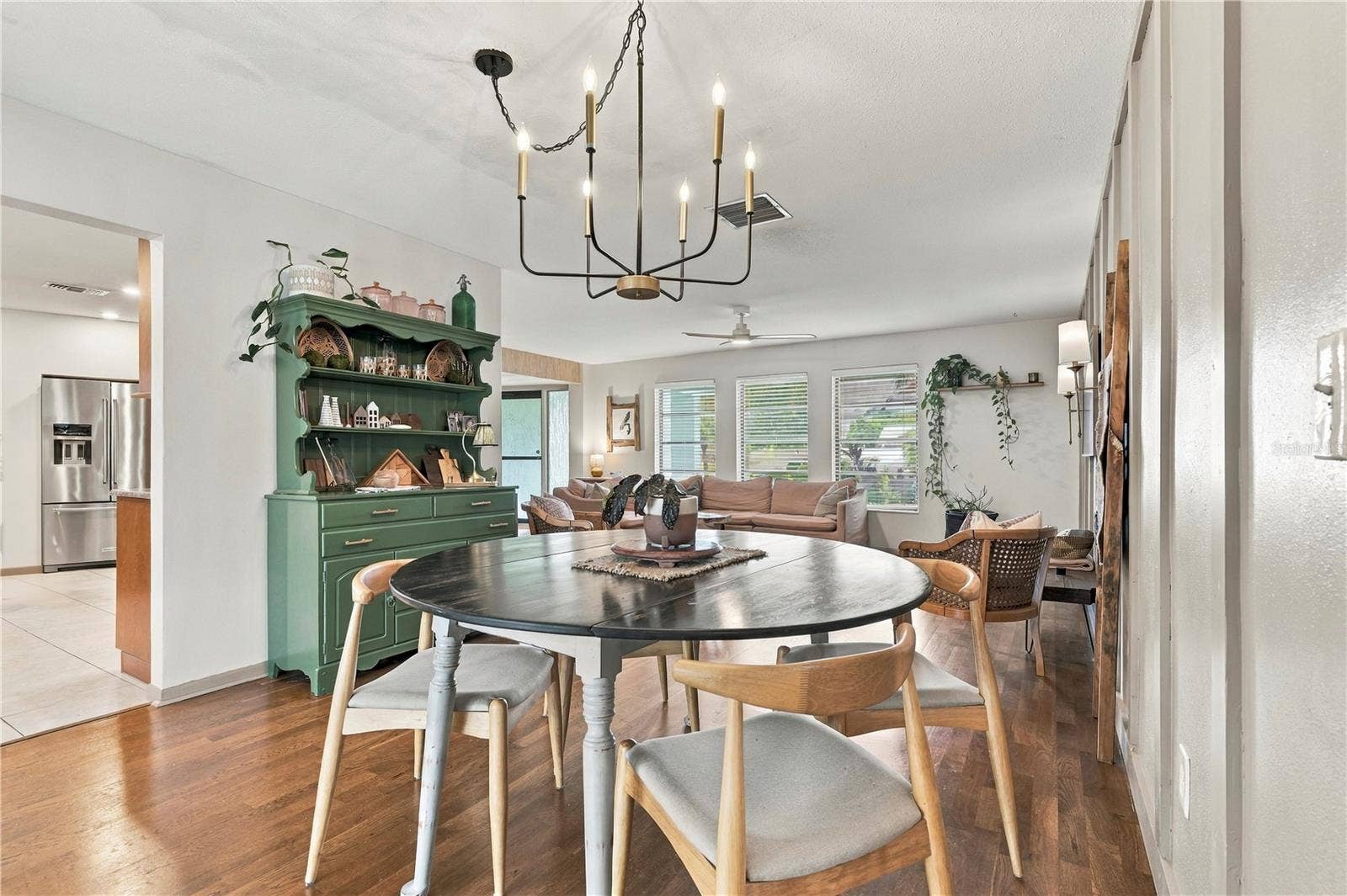 10211 139TH STREET, Largo, FL 33774 Dining room looking into living space and kitchen entry