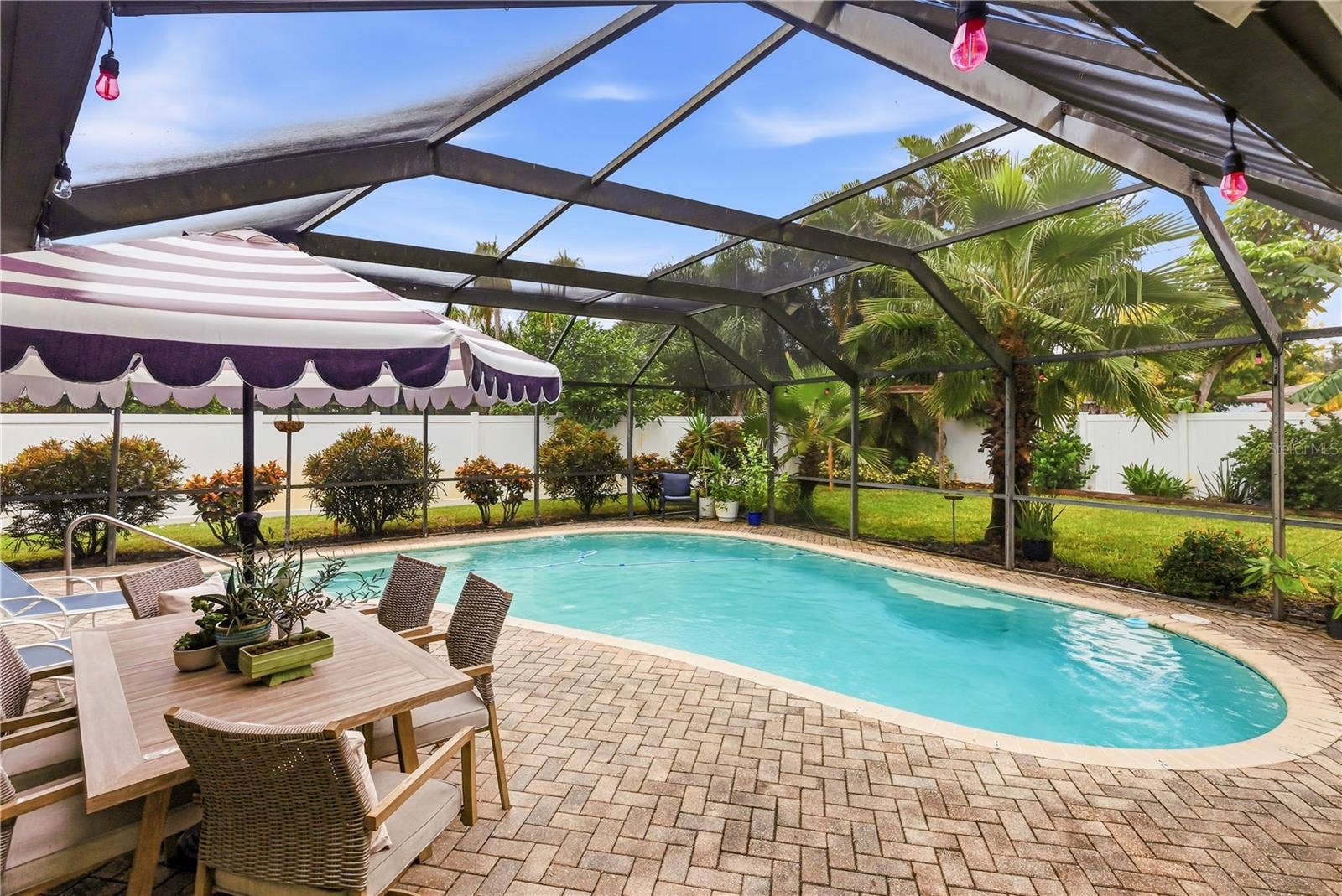 10211 139TH STREET, Largo, FL 33774 Pool view from sun room doorway