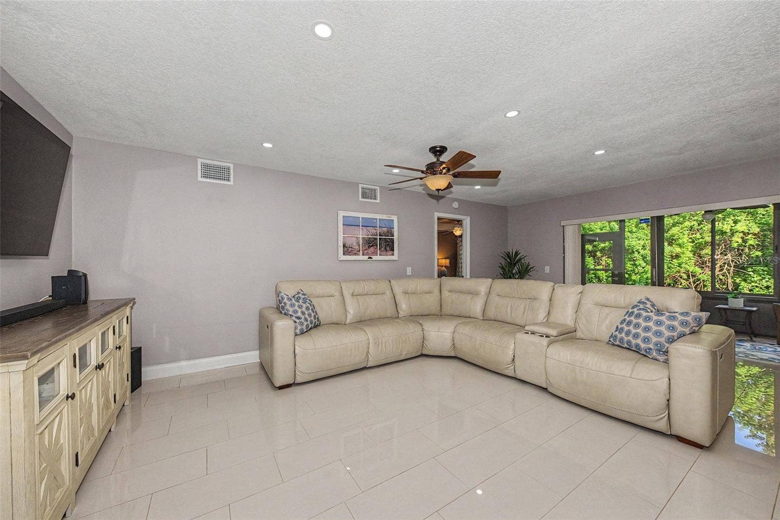 1801 E LAKE ROAD, #1D, Palm Harbor, FL 34685 Living Room with porcelain tile