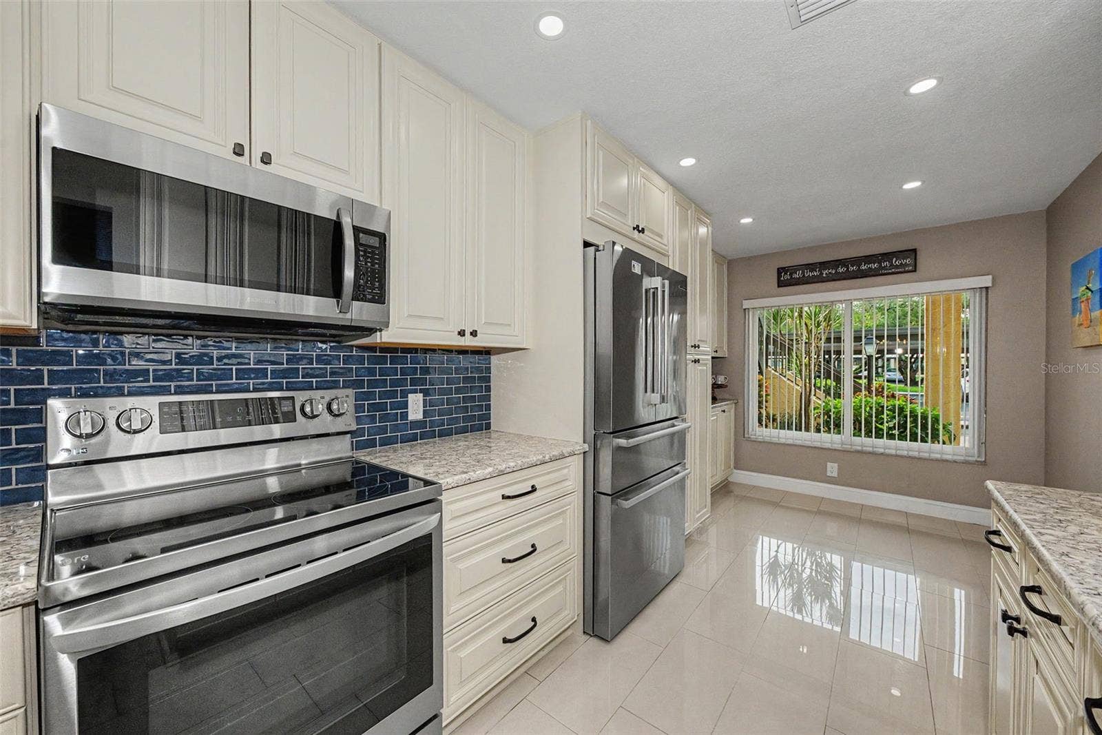 1801 E LAKE ROAD, #1D, Palm Harbor, FL 34685 Kitchen w/air fryer, convection oven combo