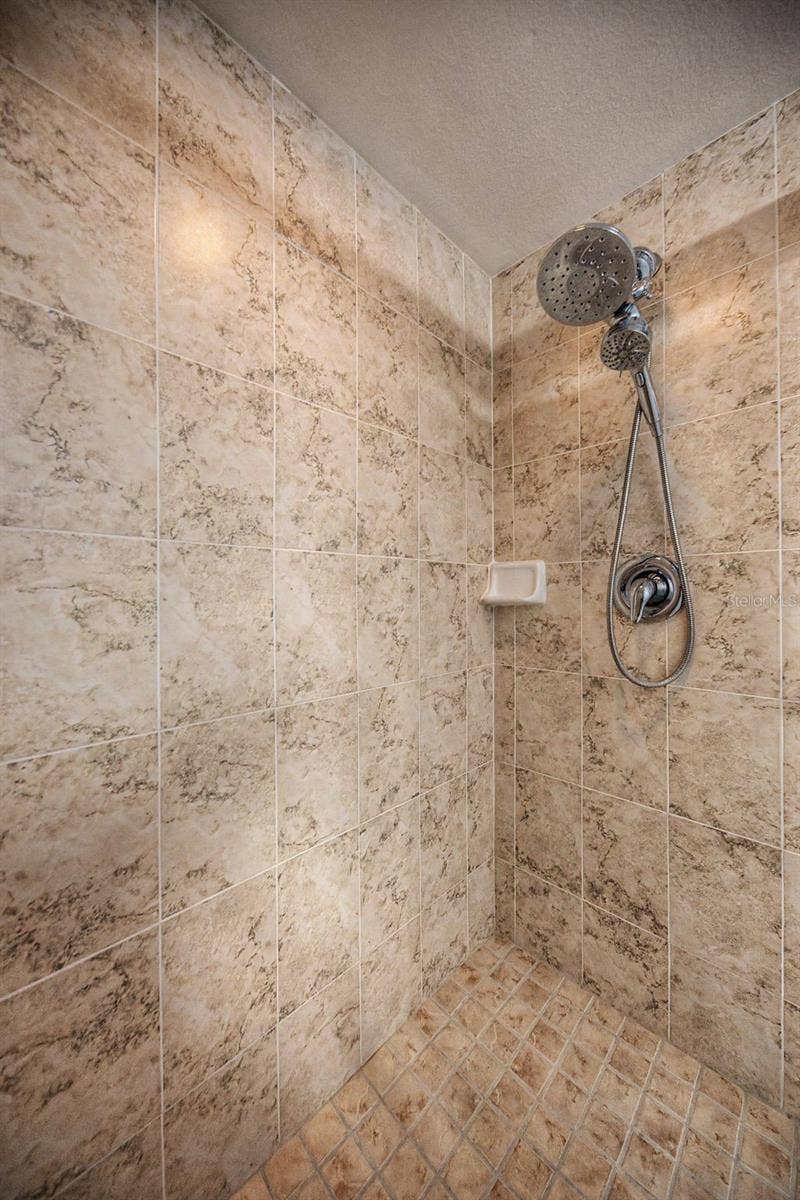 1801 E LAKE ROAD, #1D, Palm Harbor, FL 34685 Shower in Primary Bathroom