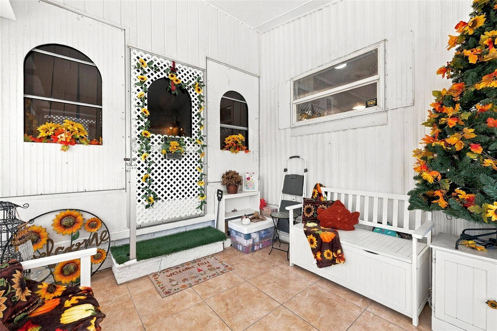 3407 TIKI DRIVE, Holiday, FL 34691 Front screened porch