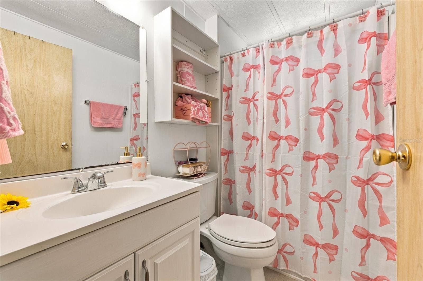 3407 TIKI DRIVE, Holiday, FL 34691 Guest bathroom