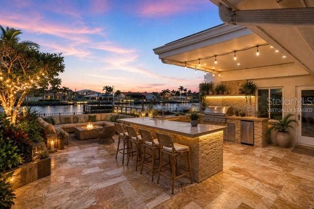 Virtually staged outdoor bar and kitchen