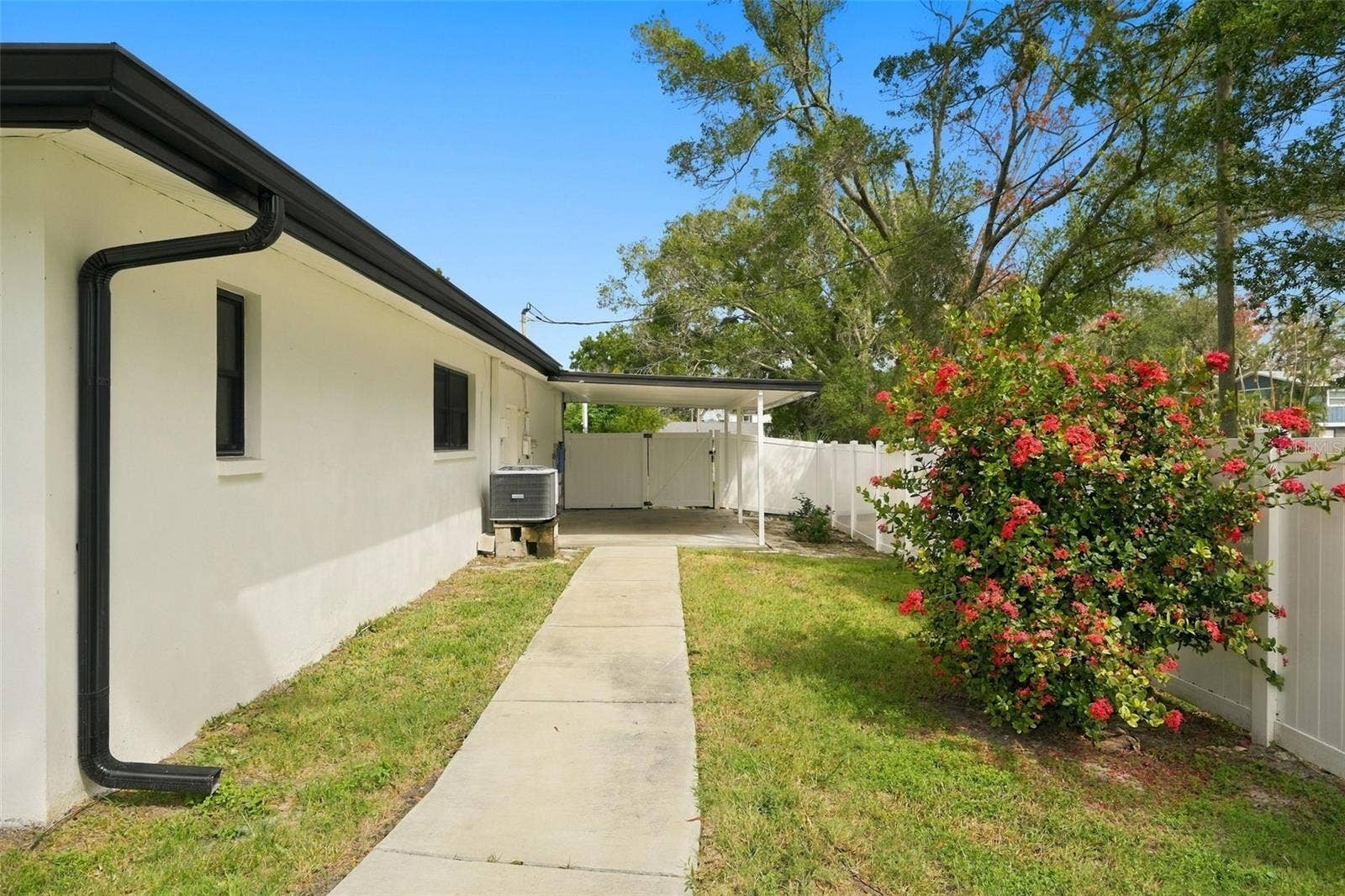 Walkway to bonus carport area