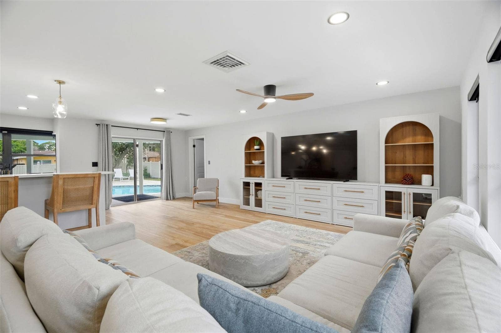 Living Room pointing toward Primary Bedroom and Eat-in Space next to Kitchen