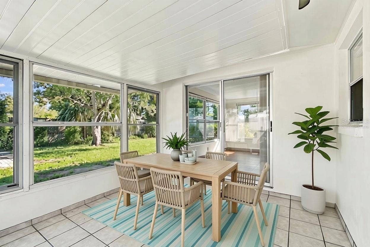 7917 MIMOSA DRIVE, Port Richey, FL 34668 Virtually Staged enclosed lanai