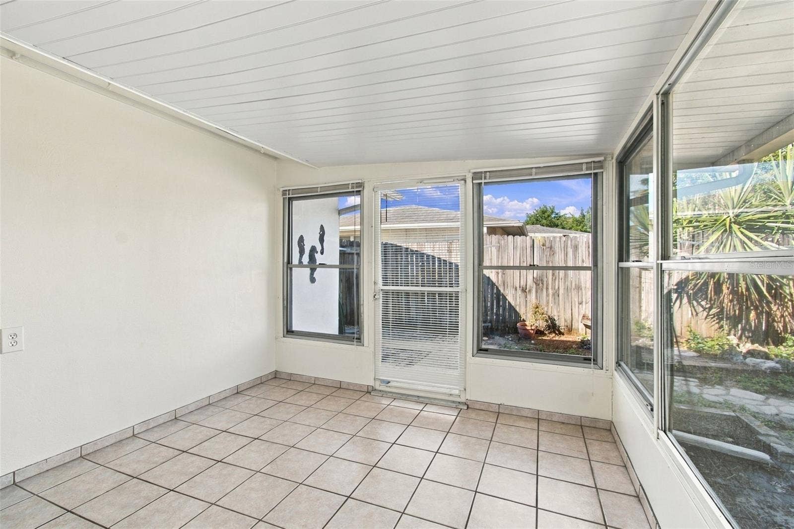 7917 MIMOSA DRIVE, Port Richey, FL 34668 enclosed lanai