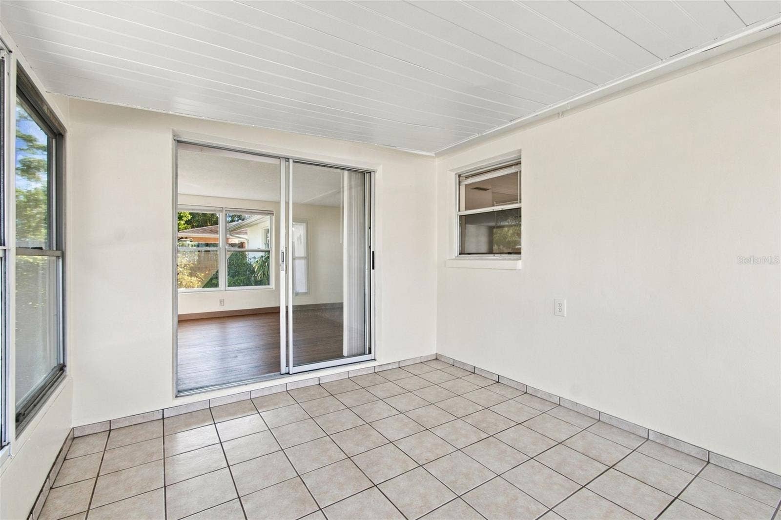 7917 MIMOSA DRIVE, Port Richey, FL 34668 enclosed lanai