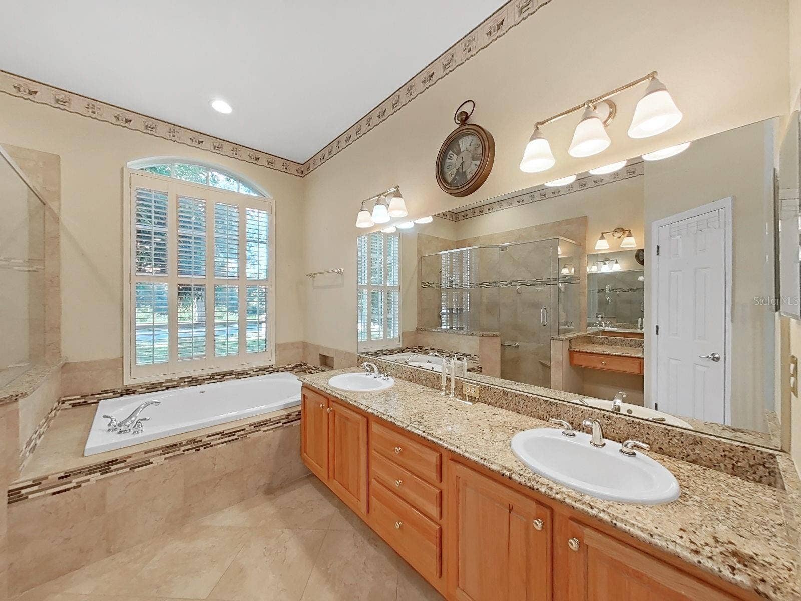 14915 DEVONSHIRE WOODS PLACE, Tampa, FL 33624 Dual Sinks ~ Spa Tub ~ Plantation Shutters
