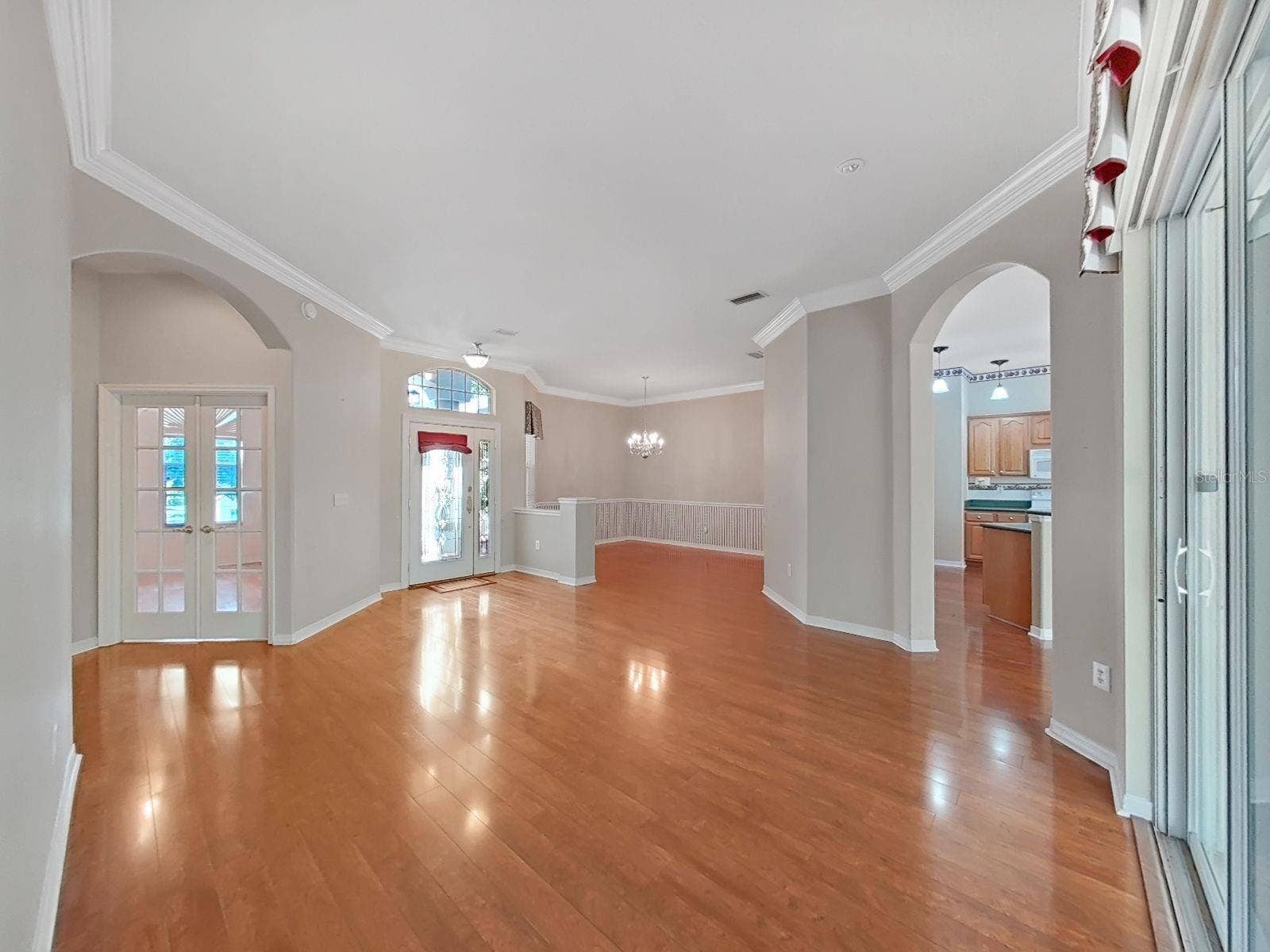 14915 DEVONSHIRE WOODS PLACE, Tampa, FL 33624 L-R: Office ~ Front Entry ~ Dining Room ~ Kitchen ~ Living Room Area