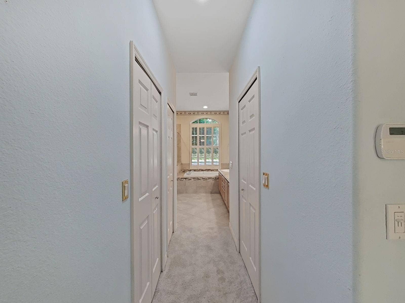 14915 DEVONSHIRE WOODS PLACE, Tampa, FL 33624 Primary Bedroom Dual Closets