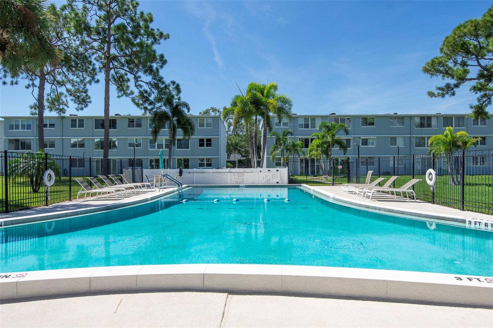 4895 BAY STREET NE, #109, St Petersburg, FL 33703 HEATED SWIMMING POOL