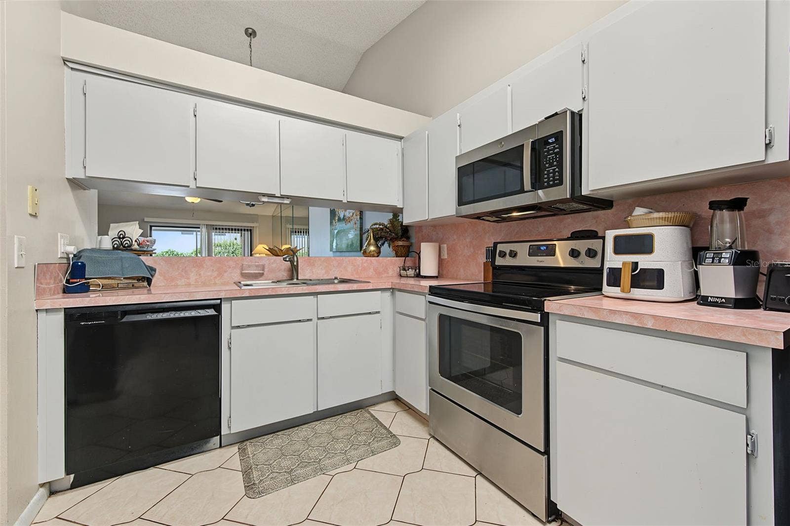 2771 SUMMERDALE DRIVE, #7, Clearwater, FL 33761 Large Kitchen with Pass through and breakfast bar