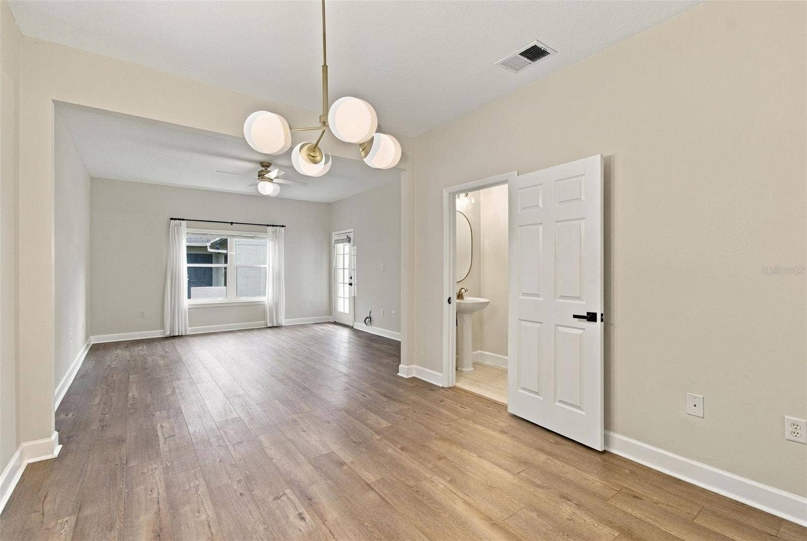 5303 POINT PLEASANT LANE, Tampa, FL 33611 Dining Room / Living Room Combo